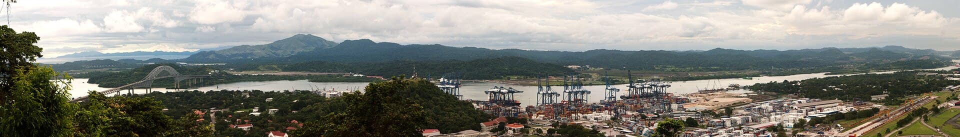 The other side of the hill - view of the canal and Bridge of the Americas connecting east to west and north to south! The Panama Canal is a ship canal which…