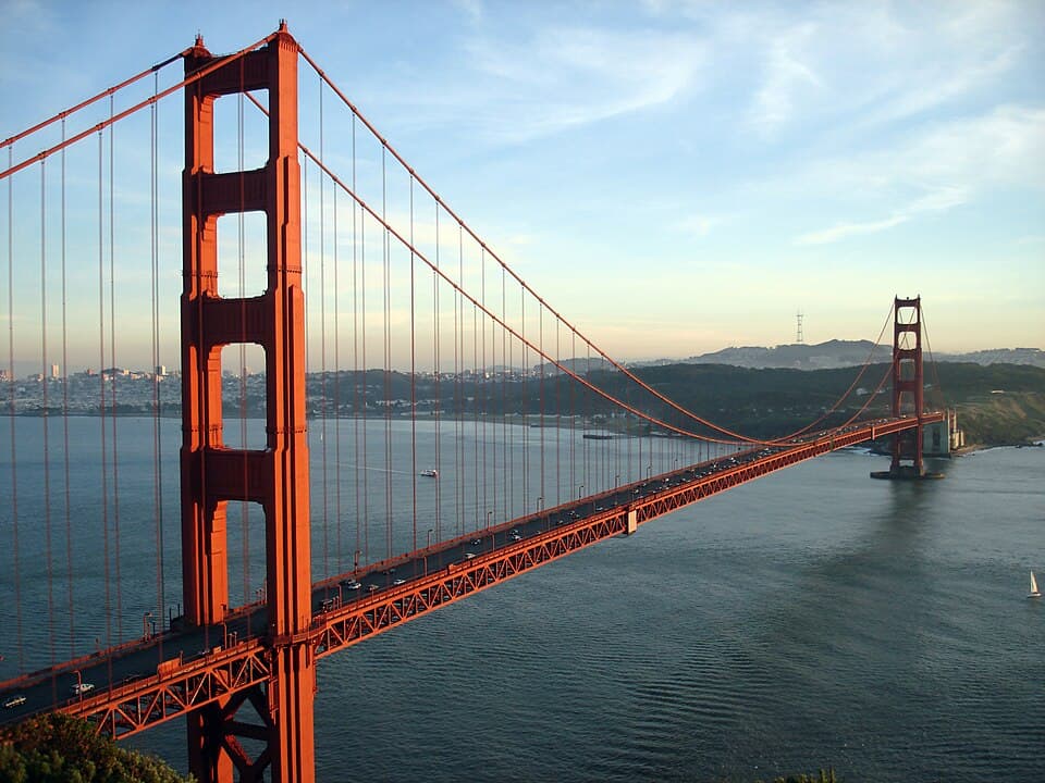 The Golden Gate Bridge and San Francisco, CA at sunset. This photo was taken from the Marin Headlands